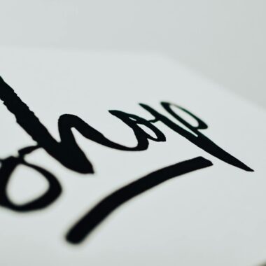 Close-up of a handwritten sign promoting support for small businesses.